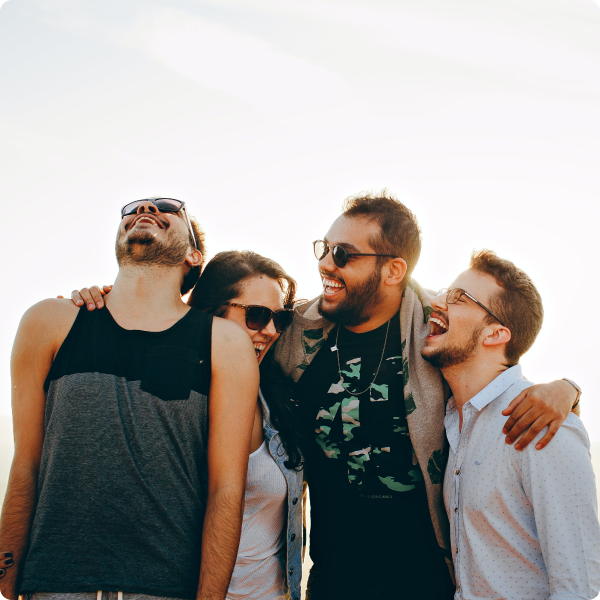 Health Loft dietitians for weight concerns A group of friends standing in the sun laughing